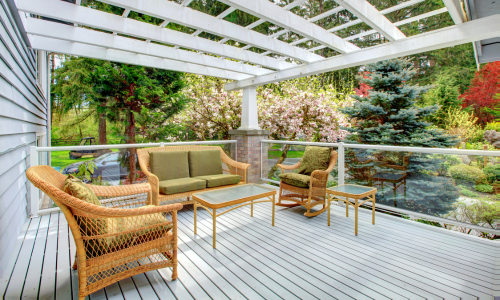 A composite deck with white railings